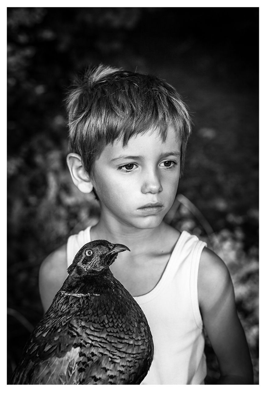 ТОП-15 дивовижних фото дітей із тваринами - фото 7