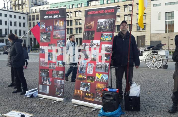 У Берліні люди з прапорами "ЛНР" агітують за "русській мір" (ФОТО) - фото 1